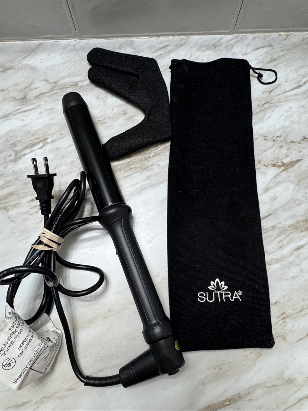 Sutra Brand Curling wand. New tested once.‎